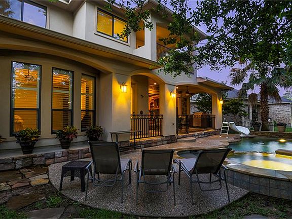 Relaxing Seating area by the Pool Perfect for Lounging Outside.