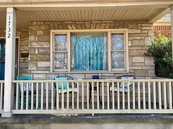 Front porch-child safe railings. Love drinking coffee with family and friends. Currently has seating for 5. Patio table for two, rocking chair and bench beside door. Great to decorate for holidays too!
