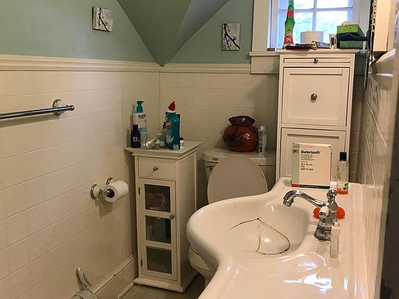 Bathroom with bathtub and shower