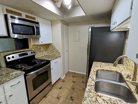 Kitchen, built-in microwave, pantry, new frig, stove/oven