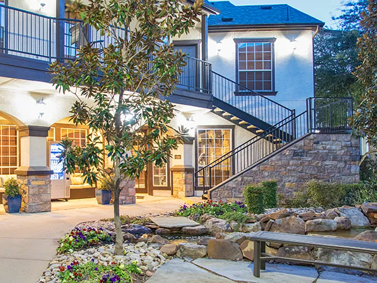 Exterior community view with updated buildings and landscaped surroundings