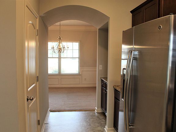 Butlers pantry leading from kitchen to dining area