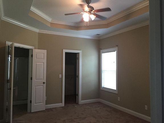 Master bedroom with walk in closet