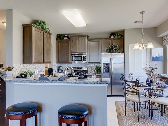 Open kitchen with dining area
