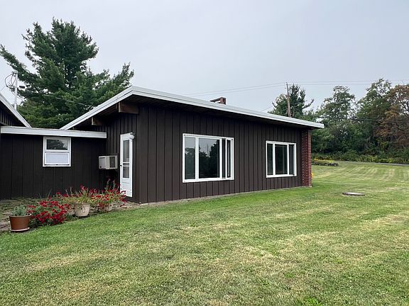 View of back of house and yard.