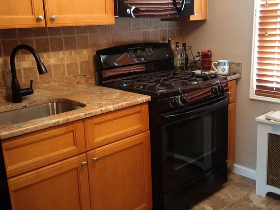 Kitchen sink, stove and microwave