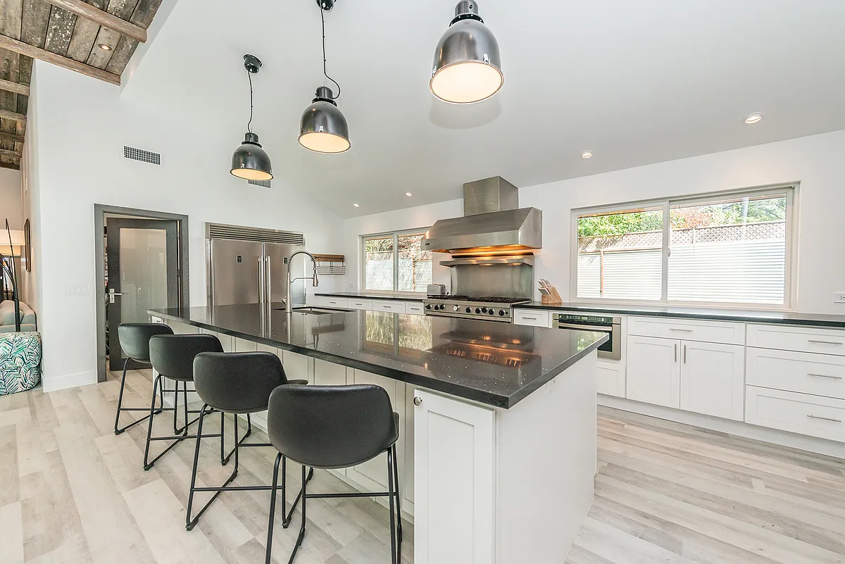 Photo 2 of 25 - 8595 Graton Rd - Sebastopol, CA Vaulted great room with exposed beams and chef's kitchen - 8595 Graton Rd