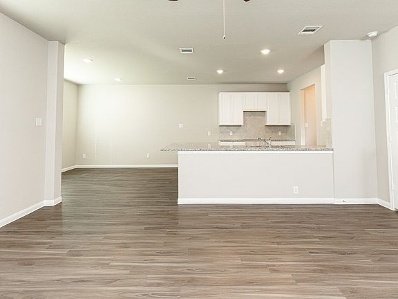 Family Room to Kitchen and Dining Area