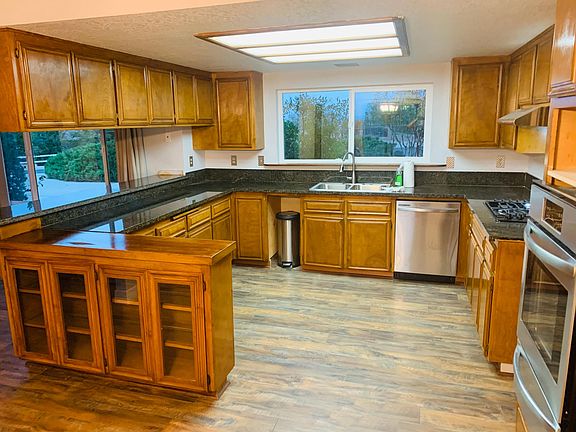 Large kitchen with maple cabinets