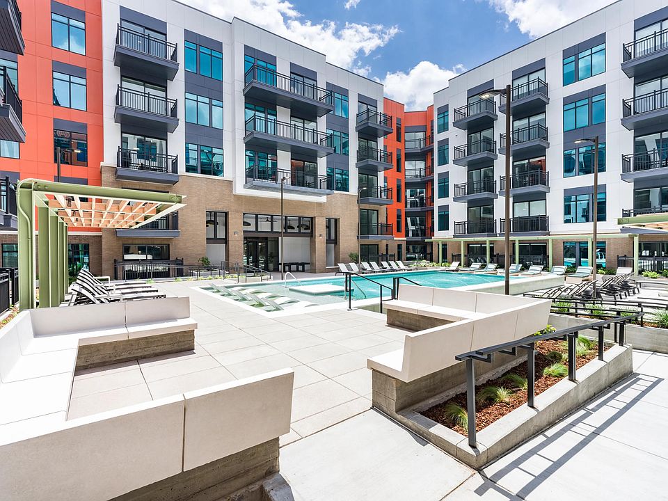 A fresh perspective on downtown leisure _ unwind in the expansive pool courtyard, designed for comfort, connection, and a splash of sun.