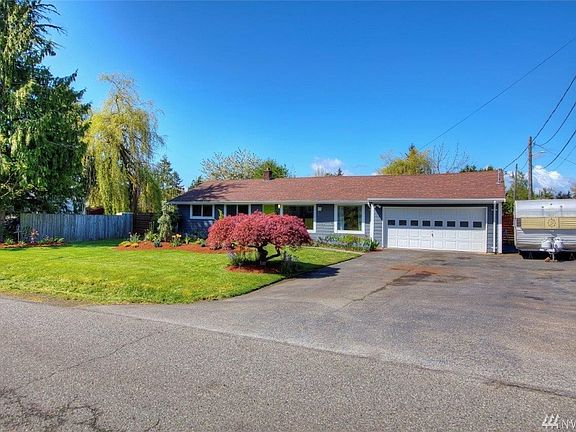 Large area to North of garage with space for RV, Boat, or larger vehicle.  Plenty of off-street parking