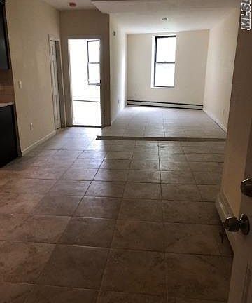 4th image of 72-55 Metropolitan Ave Floor 1