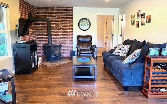 Cozy up with a roaring fire while watching your favorite TV shows or reading a book. Home also has a ductless mini split for primary energy source. Energy efficient!