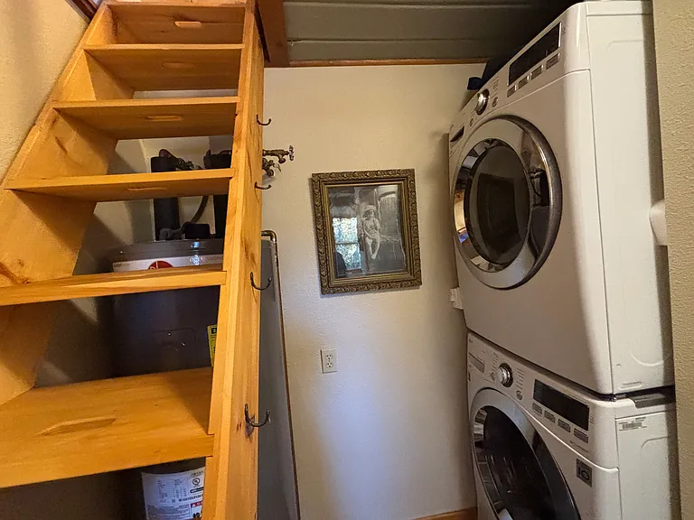 Stairs to the little loft, and new washer/dryer