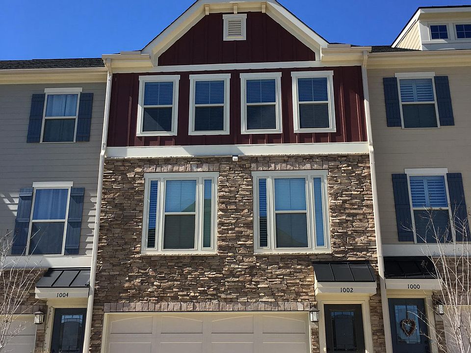Front view with two car garage