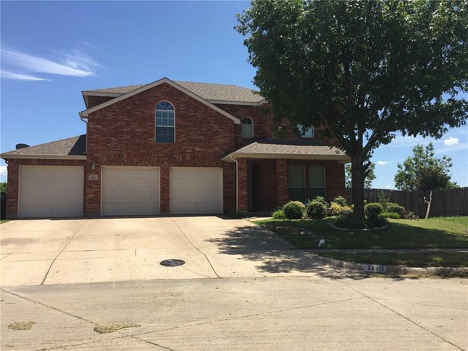 Fully functional 3-car garage has a large driveway; 3 garage door openers with separate controls.