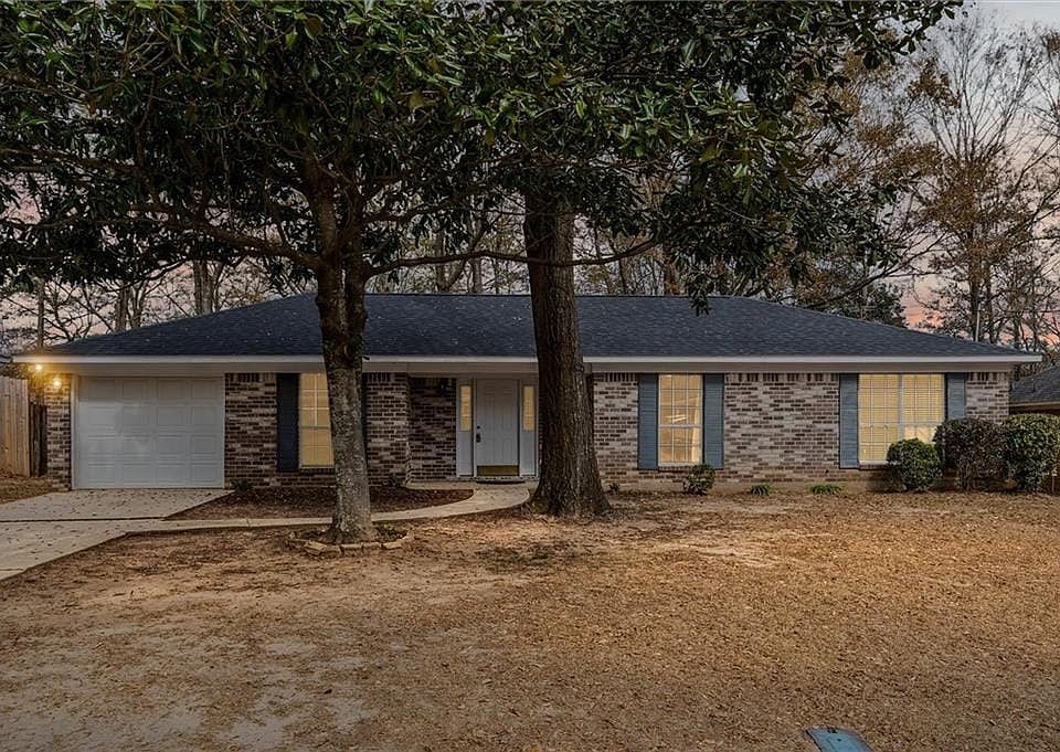 Imagine yourself living in this nice brick home.