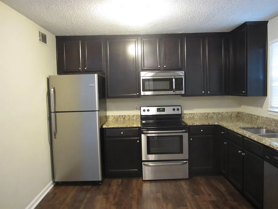 Kitchen with granite countertops and stainless appliances
