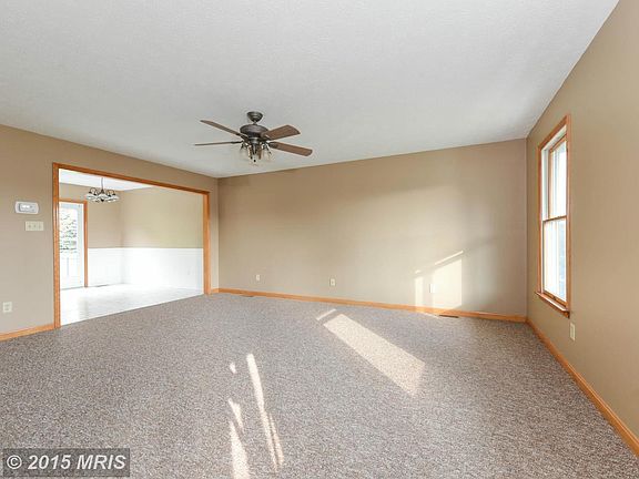 VIEW OF LIVING ROOM FROM FRONT ENTRANCE