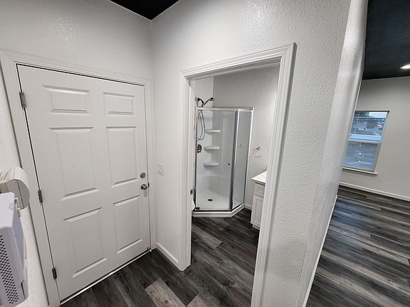 Unit 1 Entryway & Bathroom