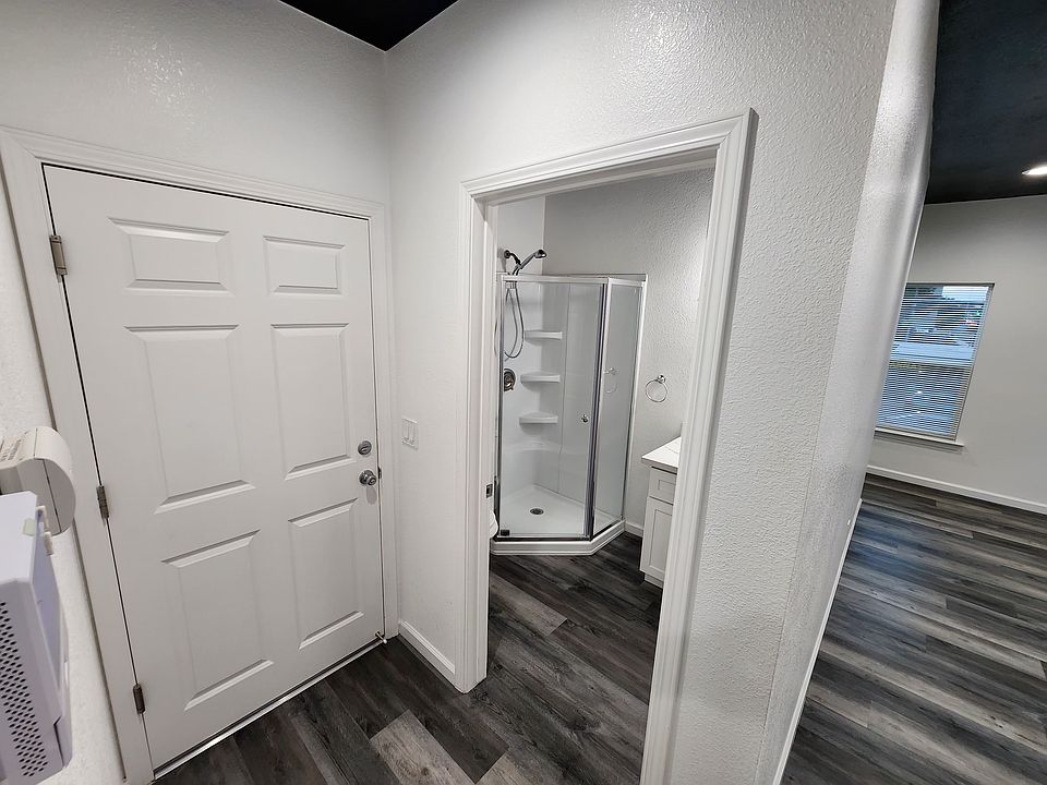 Unit 1 Entryway & Bathroom