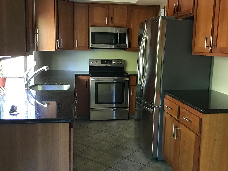Updated kitchen with new stainless refrigerator