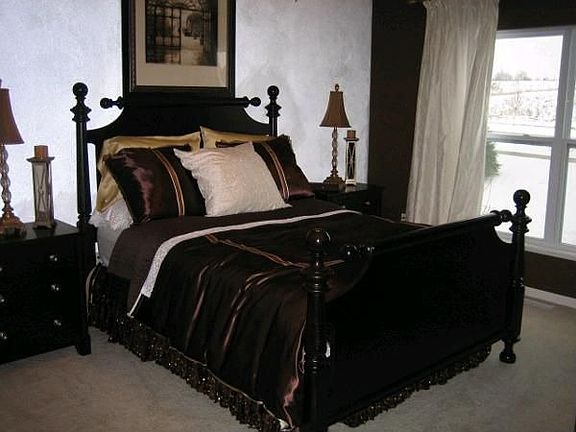 Master bedroom with cathedral ceilings and private bath