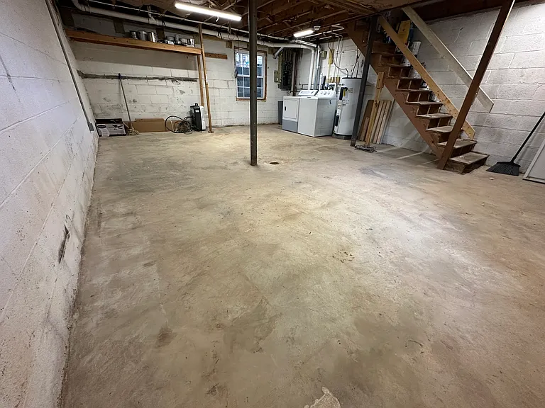 unfinished basement with in unit washer and dryer. adds a lot of square footage for storage or work out room