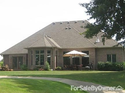 View from the 18th tee : Private patio off of master bedroom as well as a large patio of of main hom