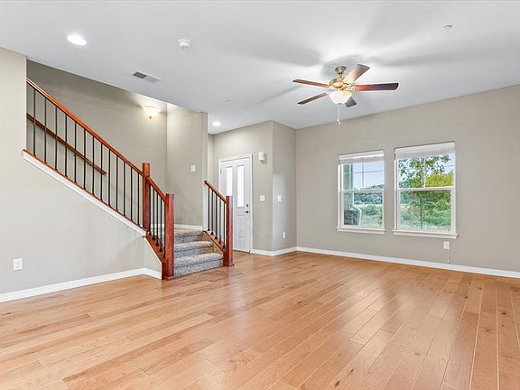 Open-concept main floor, looking at the front entryway.