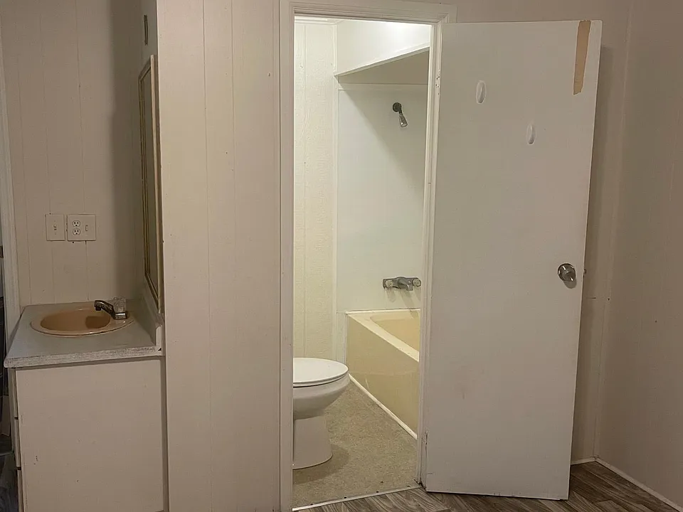 Master bathroom with tub