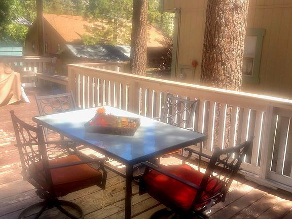 Patio surrounded with pine trees
