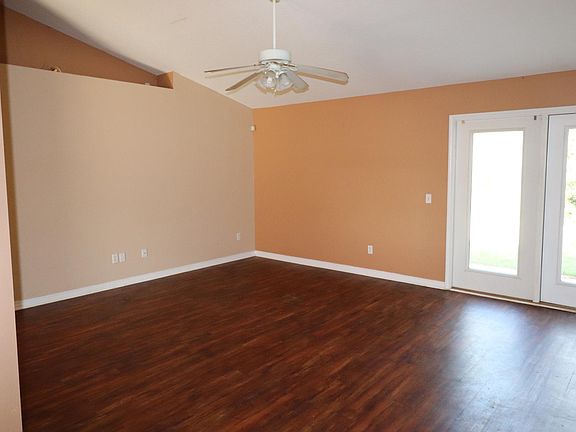 Large Living room with direct access to back yard.