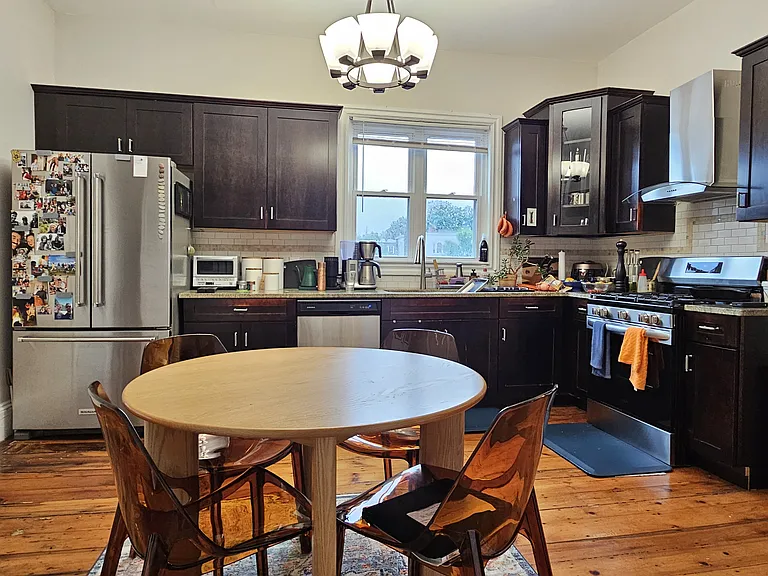 Roomy eat-in kitchen with stainless appliances