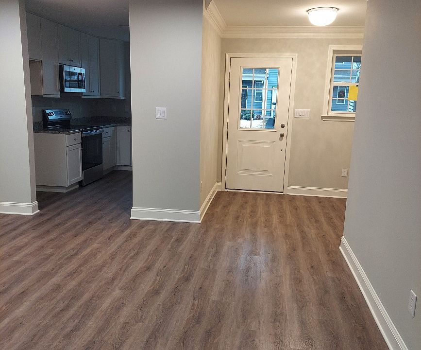 Entryway into Dining/Living Area and exit to Garage