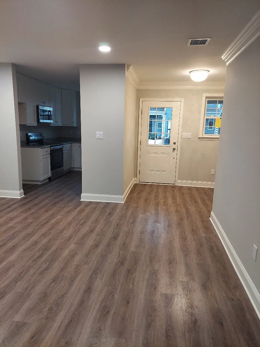 Entryway into Dining/Living Area and exit to Garage - 920 Still Waters Ln #920