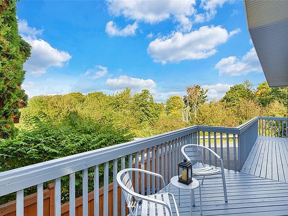 Wraparound deck with tranquil outlook.