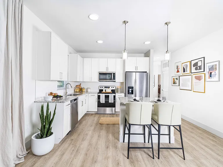 Elevate your kitchen experience with Modera Georgetown's ENERGY STAR_ stainless steel appliance package. From the double-door refrigerator with a water and icemaker, every detail is crafted for modern living.