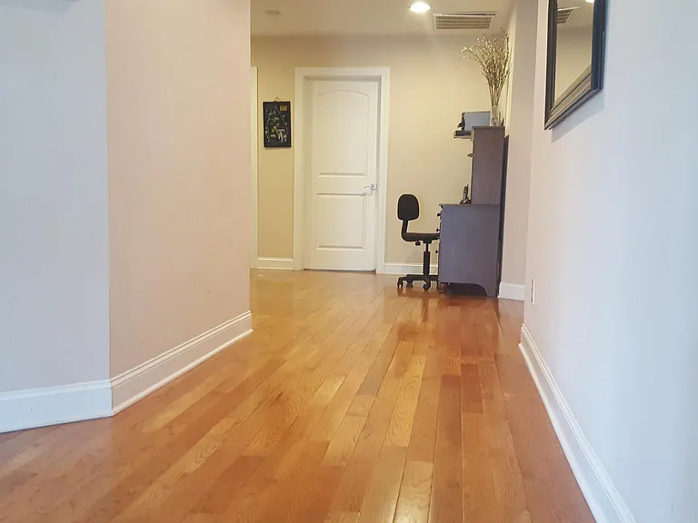 Upstairs hallway to four bedrooms