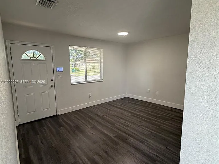 590 NW 58th St — Photo 3