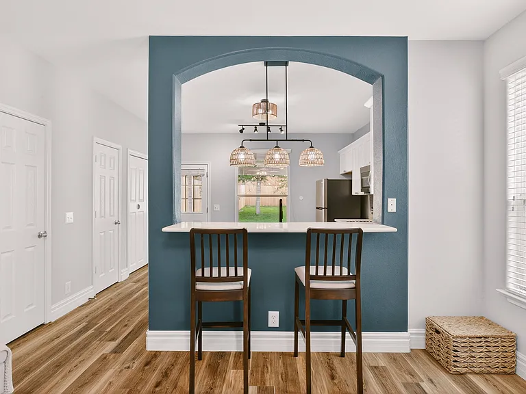 Kitchen bar seating; barstools included.