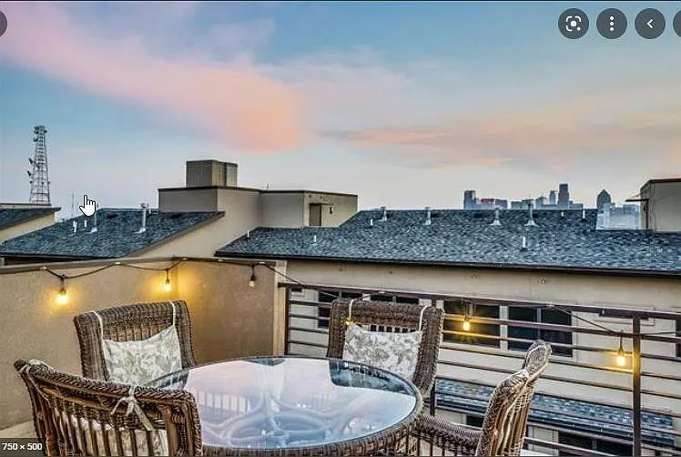 Rooftop with downtown Dallas views.