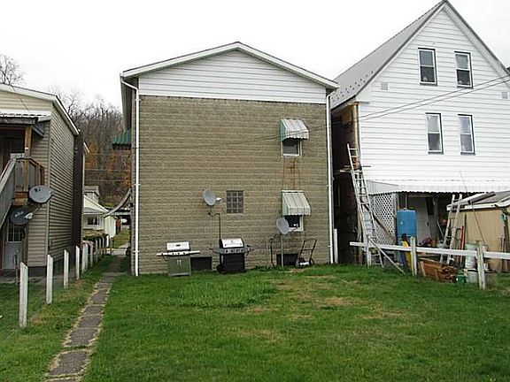 Exterior Front. Fenced in back yard