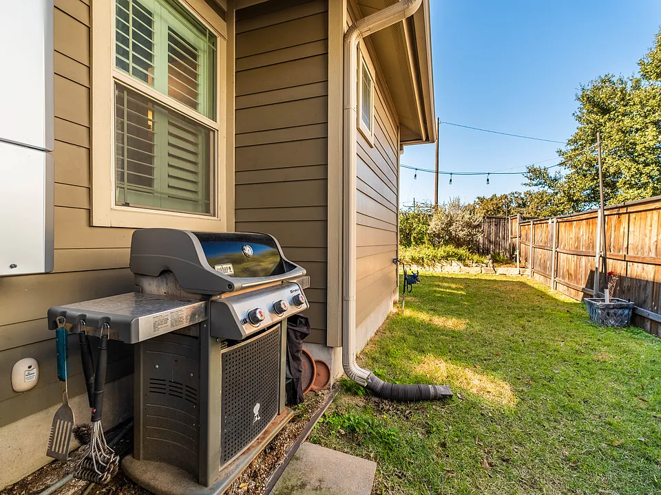 Gas Grill and backyard