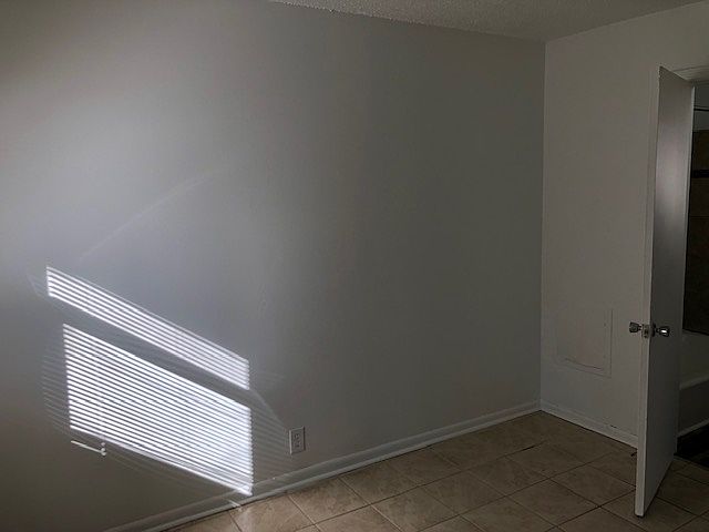 Bedroom 1 with adjoining bathroom.