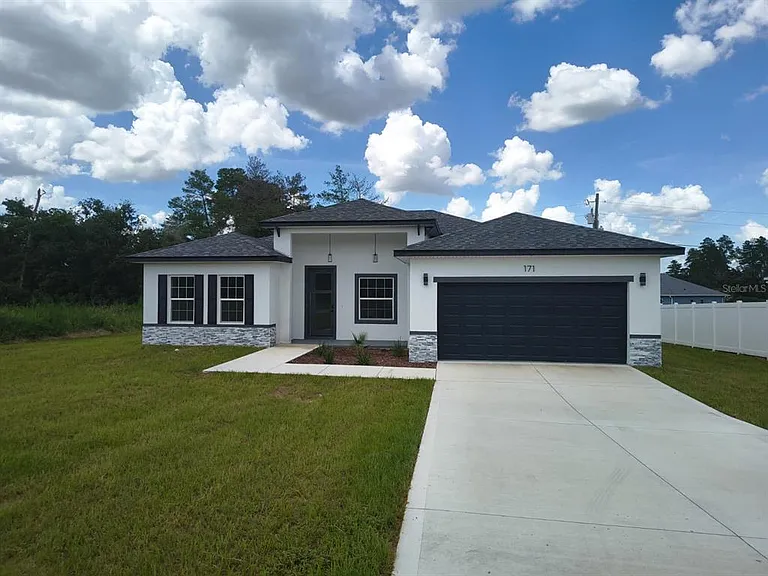 171 Marion Oaks Trl — Photo 1