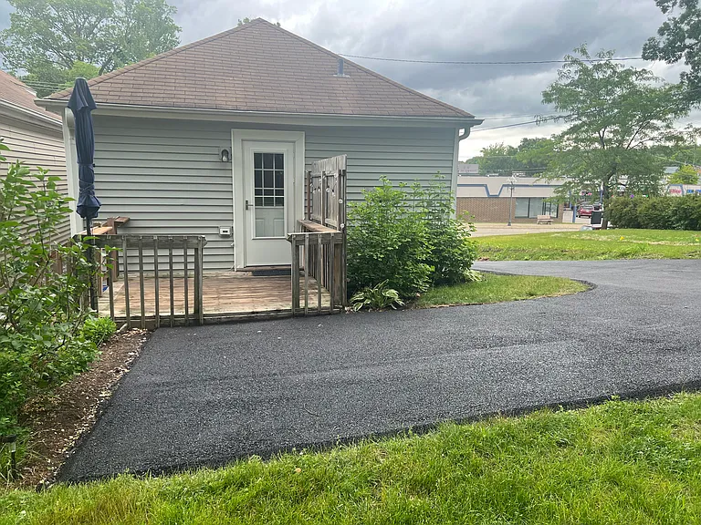 Back of the house, dedicated parking pad