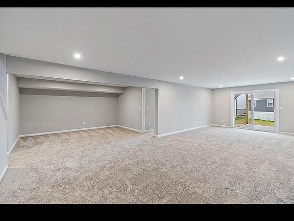 Private family room and outside patio. Owner has built a bar in the alcove where the drop ceiling is.