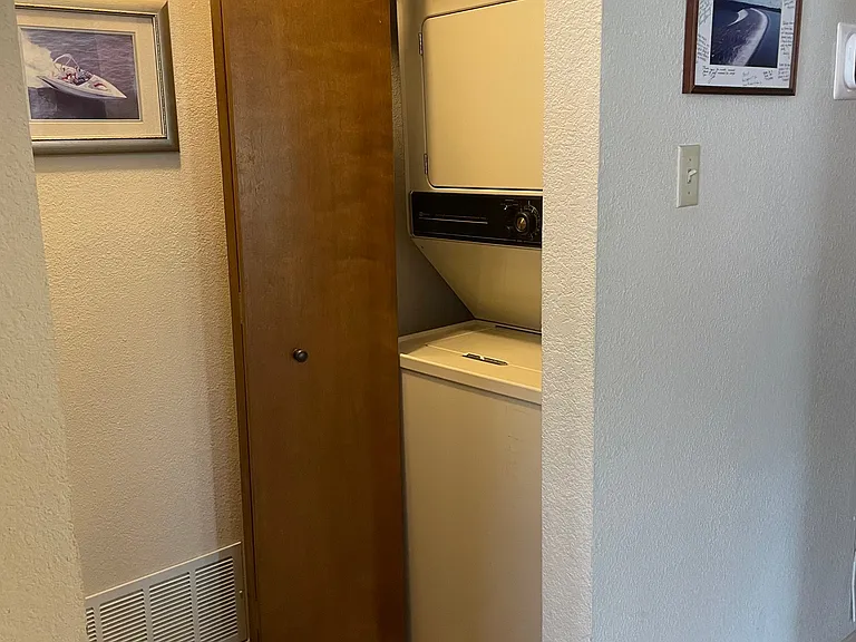 Stackable washer/dryer is included.