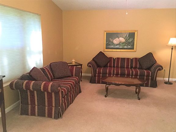 Combination Living/Dining Room - Vaulted Ceiling in Living Room area.